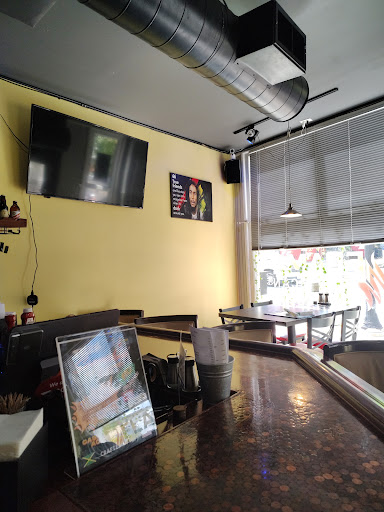 Photo of Flame Jamaican Cuisine - 44 Market St, Somersworth, NH 03878