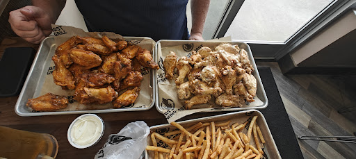 Photo of East Coast Wings + Grill - 5014 Peters Creek Pkwy, Winston-Salem, NC 27127